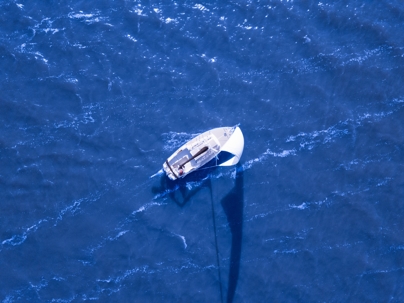 overhead view of sailboat on water