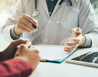 Doctor writing Medicare