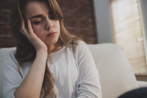 sad woman mourning loss of loved one